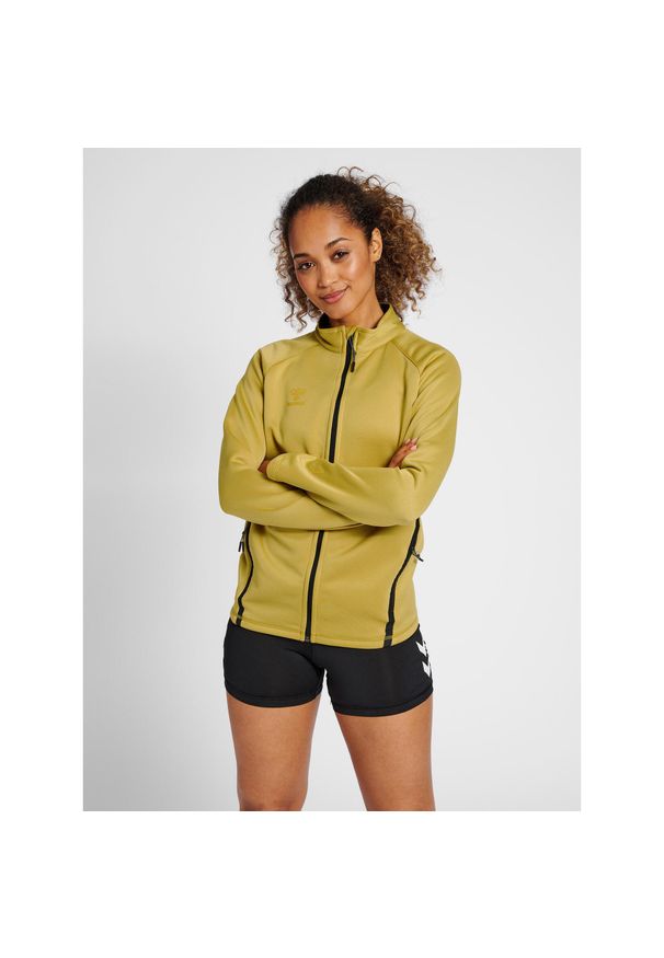 Bluza do piłki ręcznej damska Hummel Cima XK zapinana na zamek. Kolor: beżowy. Materiał: dresówka. Sport: piłka ręczna