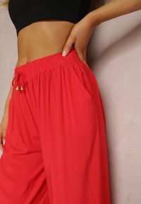 Renee - Czerwone Spodnie Karrill. Kolor: czerwony. Materiał: wiskoza. Długość: długie. Sezon: lato. Styl: elegancki