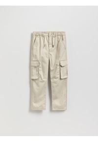 Reserved - Spodnie z kontrastowymi przeszyciami - złamana biel. Materiał: tkanina, bawełna