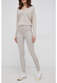 JDY Spodnie damskie kolor beżowy dopasowane high waist. Stan: podwyższony. Kolor: beżowy