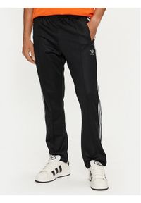 Adidas - adidas Spodnie dresowe adicolor Classics Beckenbauer II5764 Czarny Slim Fit. Kolor: czarny. Materiał: syntetyk, bawełna #1