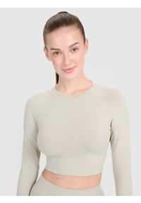 4f - 4F Longsleeve treningowy crop-top z wycięciem na plecach damski - beżowy M/L. Kolor: beżowy. Długość rękawa: długi rękaw
