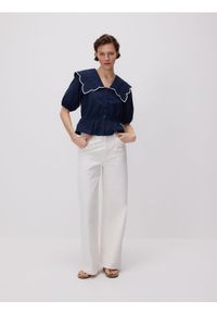 Reserved - Jeansy wide leg ze średnim stanem - biały. Kolor: biały #1