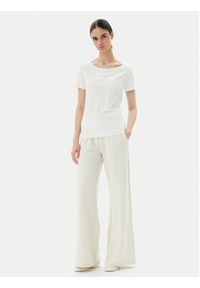 EA7 Emporio Armani Spodnie dresowe 7W000083 AF13135 U1112 Beżowy Wide Leg. Kolor: beżowy. Materiał: bawełna #4