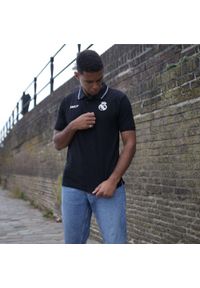Real Madrid polo męskie. Typ kołnierza: polo. Kolor: czarny. Materiał: bawełna. Sport: piłka nożna #1