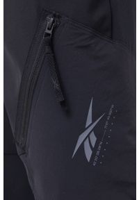 Reebok - Spodnie. Kolor: czarny. Materiał: materiał. Wzór: nadruk #4