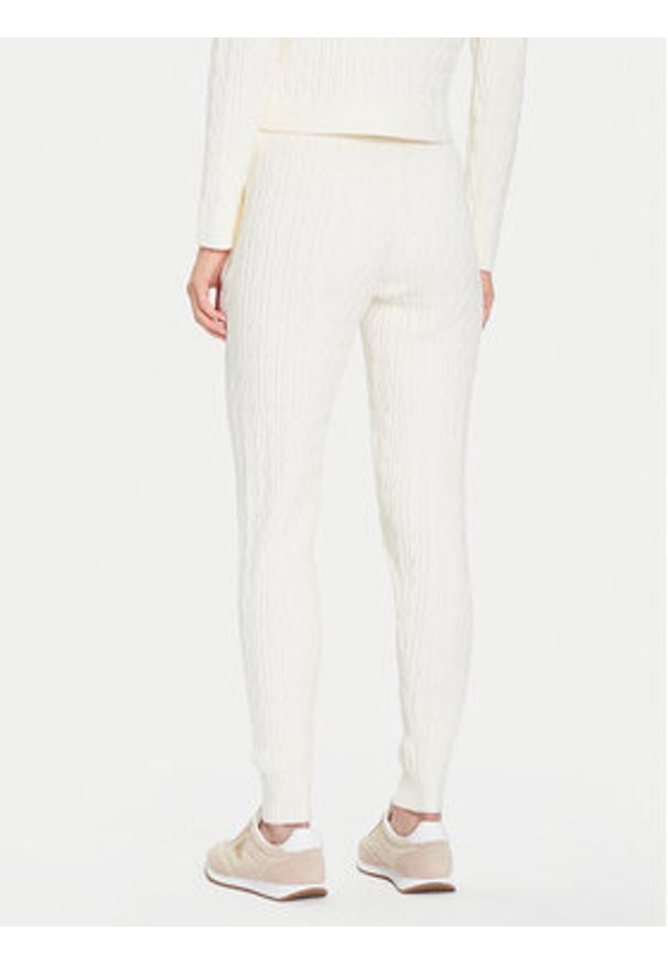 Guess Spodnie dzianinowe V5BB20 Z0572 Beżowy Regular Fit. Kolor: beżowy. Materiał: syntetyk