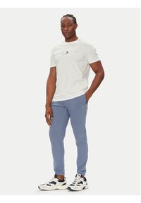 Tommy Jeans Spodnie dresowe Flag DM0DM20473 Niebieski Slim Fit. Kolor: niebieski. Materiał: bawełna #3
