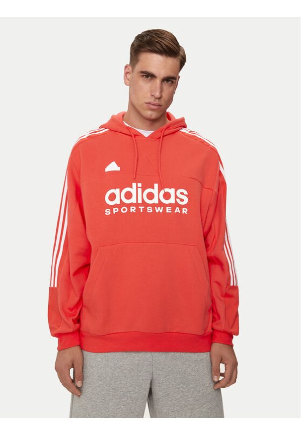 Adidas - adidas Bluza House of Tiro IV8123 Pomarańczowy Loose Fit. Kolor: pomarańczowy. Materiał: bawełna