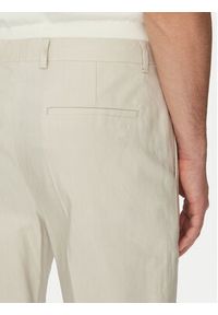 Calvin Klein Spodnie materiałowe K10K114400 Beżowy Slim Fit. Kolor: beżowy. Materiał: len, lyocell #3