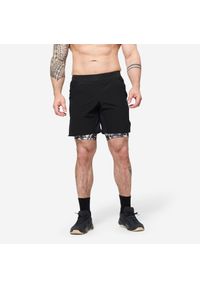 DOMYOS - Spodenki fitness cardio męskie Domyos 2 w 1. Kolor: czarny, biały, wielokolorowy. Materiał: elastan, poliester, materiał. Długość: krótkie. Sport: fitness