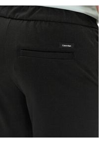 Calvin Klein Spodnie materiałowe K10K113647 Czarny Comfort Fit. Kolor: czarny. Materiał: syntetyk #5