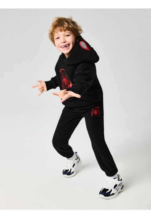 Sinsay - Spodnie jogger Spider-Man - czarny. Kolor: czarny