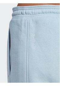 Adidas - adidas Spodnie dresowe All SZN Fleece Graphic IL3244 Błękitny Loose Fit. Kolor: niebieski. Materiał: bawełna #3