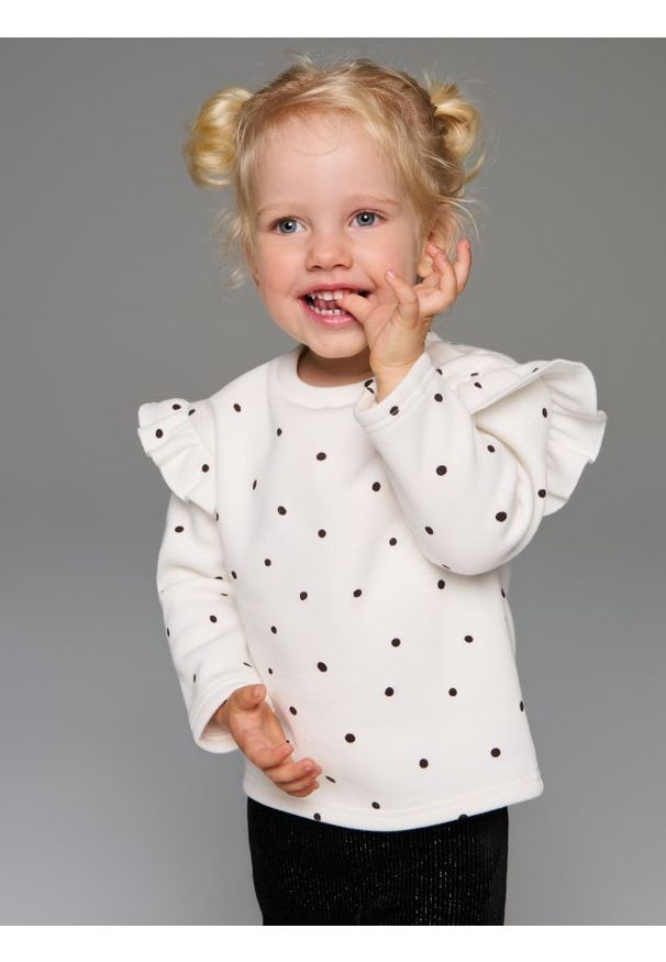 Sinsay - Ocieplana bluzka z długim rękawem w kropki - kremowy. Kolor: kremowy. Długość rękawa: długi rękaw. Długość: długie. Wzór: kropki