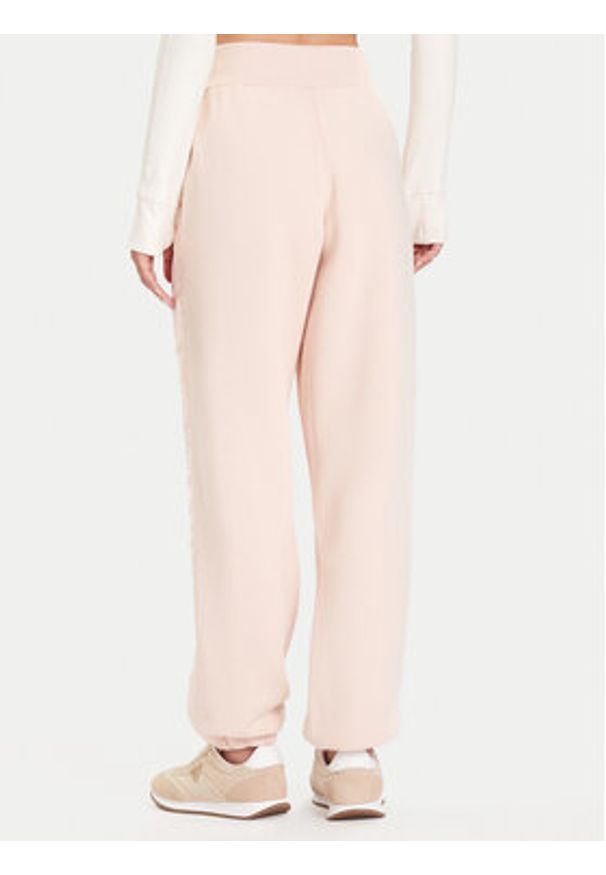 Guess Spodnie dresowe V5BB10 KB681 Różowy Regular Fit. Kolor: różowy. Materiał: bawełna