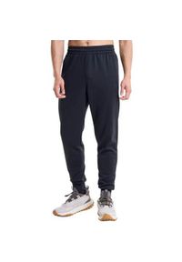 Spodnie treningowe męskie Under Armour Fleece Joggers Loose. Kolor: czarny, biały, wielokolorowy. Materiał: bawełna. Sport: turystyka piesza