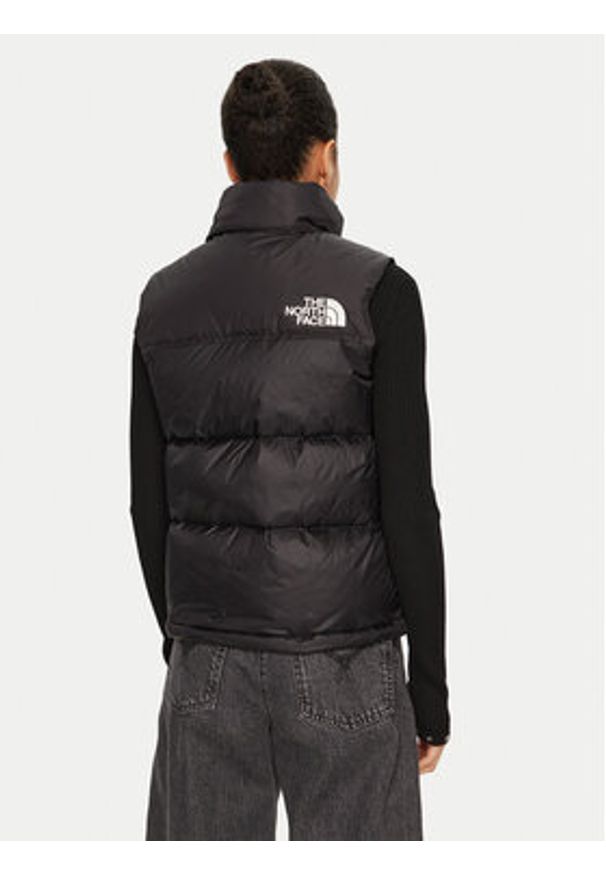 The North Face Bezrękawnik 1996 Retro Nuptse NF0A3XEP Czarny Regular Fit. Kolor: czarny. Materiał: syntetyk. Długość rękawa: bez rękawów. Styl: retro