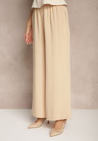 Renee - Beżowe Szerokie Spodnie Typu Palazzo High Waist Araneira. Okazja: na co dzień, na spotkanie biznesowe, na spacer. Stan: podwyższony. Kolor: beżowy. Styl: biznesowy, elegancki, casual #3