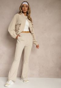 Renee - Beżowe Dresowe Spodnie Flare z Gumką w Pasie Efranaria. Okazja: na co dzień. Kolor: beżowy. Materiał: dresówka. Styl: klasyczny, casual, elegancki