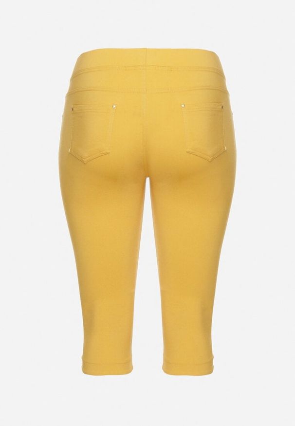 Born2be - Żółte Spodnie z Bawełny o Kroju Capri Dolonisa. Okazja: na co dzień. Kolor: żółty. Materiał: bawełna. Styl: młodzieżowy, elegancki, casual