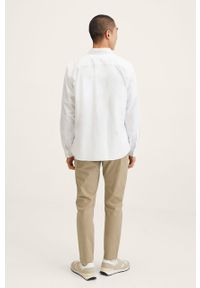 Mango Man spodnie męskie kolor beżowy dopasowane. Kolor: beżowy. Materiał: tkanina, włókno. Wzór: gładki #2