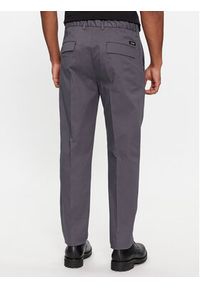 Calvin Klein Spodnie garniturowe Modern Twill Tapered Pleat K10K111490 Szary Slim Fit. Kolor: szary. Materiał: bawełna