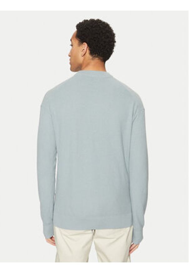 Calvin Klein Jeans Sweter J30J326746 Niebieski Relaxed Fit. Kolor: niebieski. Materiał: bawełna