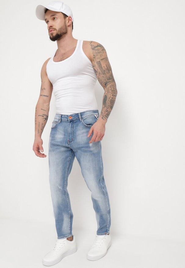 Born2be - Niebieskie Jeansy Skinny z Przeszyciami z Kieszeniami i Suwakiem Skili. Kolor: niebieski. Wzór: aplikacja