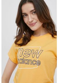 New Balance t-shirt damski kolor żółty. Kolor: żółty. Wzór: nadruk