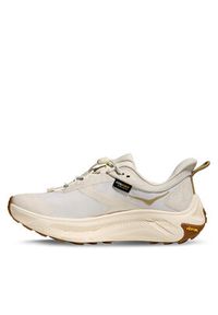 HOKA - Hoka Sneakersy Transport 2 1171850 Beżowy. Kolor: beżowy. Materiał: materiał #2