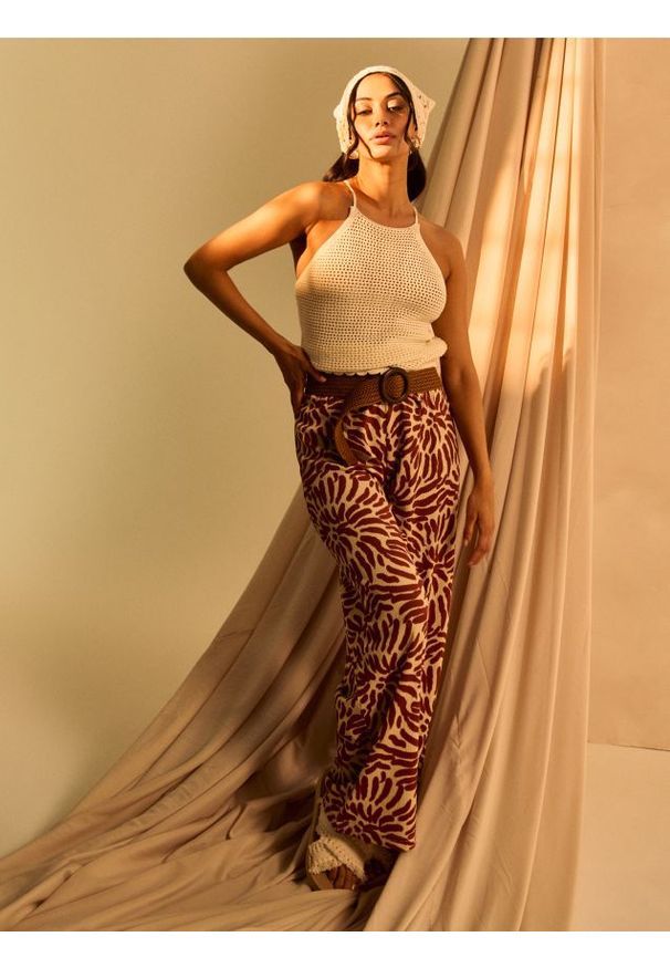 Sinsay - Spodnie wide leg z abstrakcyjnym wzorem - wielobarwny