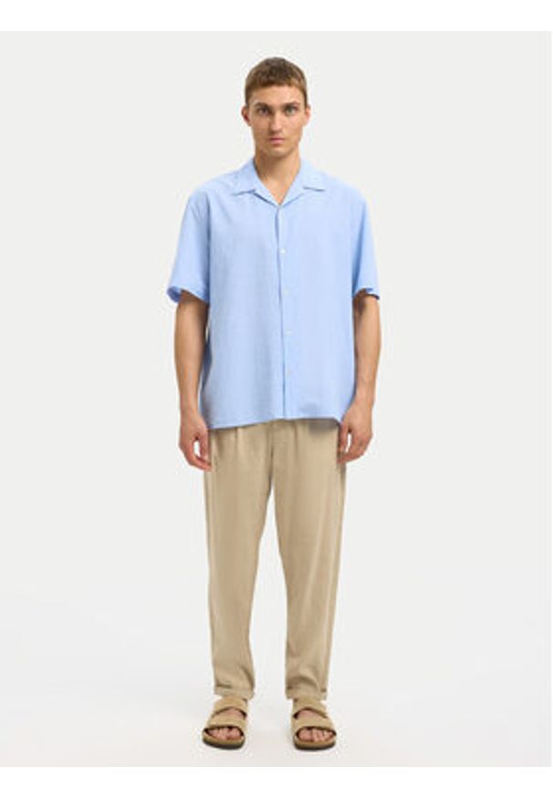 Selected Homme Chinosy 16092732 Beżowy Relaxed Fit. Kolor: beżowy. Materiał: bawełna
