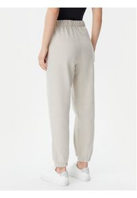 GAP - Gap Spodnie dresowe 765568-03 Beżowy Relaxed Fit. Kolor: beżowy. Materiał: bawełna #4