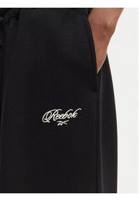 Reebok Spodnie dresowe Dominka RK25696CCW Czarny Regular Fit. Kolor: czarny. Materiał: bawełna #13