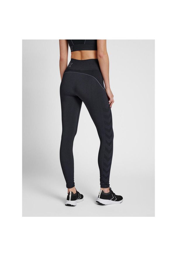 Damskie legginsy ze średnim stanem Hummel TE Christel. Kolor: czarny. Materiał: materiał, prążkowany, dzianina. Wzór: jodełka. Sport: fitness