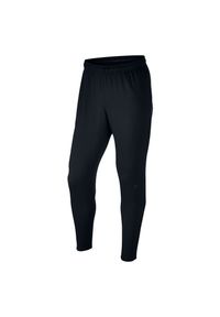 Spodnie Nike Dry Squad 859225. Materiał: materiał. Technologia: Dri-Fit (Nike). Wzór: napisy, paski. Sport: piłka nożna, fitness #1