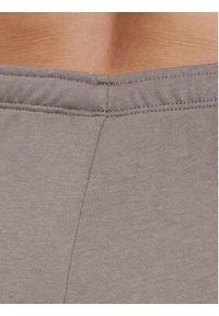 Nike Spodnie dresowe Chill Terry FN2434 Brązowy Regular Fit. Kolor: brązowy. Materiał: syntetyk, bawełna #3