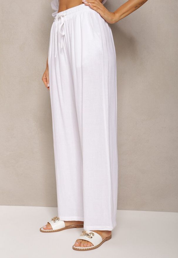 Renee - Białe Szerokie Spodnie z Wiskozy z Dodatkiem Lnu Delsira. Okazja: na co dzień. Stan: podwyższony. Kolekcja: plus size. Kolor: biały. Materiał: wiskoza, len. Długość: długie. Styl: casual, elegancki