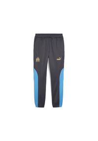 Puma - Męskie spodnie Olympique de Marseille ftblNRGY+ PUMA. Kolor: szary, wielokolorowy, beżowy. Materiał: dresówka. Sport: piłka nożna