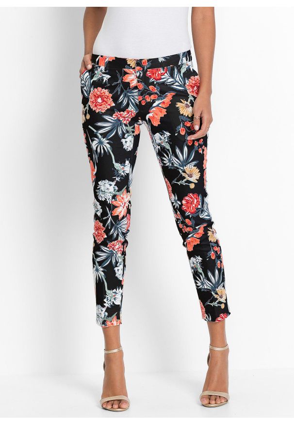 bonprix - Spodnie 7/8 ze stretchem. Kolor: czarny. Wzór: nadruk, kwiaty. Styl: elegancki, klasyczny