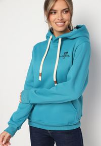 Born2be - Niebieska Bluza z Dodatkiem Bawełny Wykończona Sznurkami i Kapturem Aseria. Okazja: na co dzień. Typ kołnierza: kaptur. Kolor: niebieski. Materiał: bawełna. Długość rękawa: długi rękaw. Długość: długie. Styl: klasyczny, casual