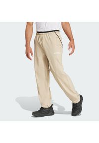 Adidas - Spodnie Terrex Multi Liteflex. Kolor: beżowy. Materiał: materiał. Sezon: lato. Sport: turystyka piesza