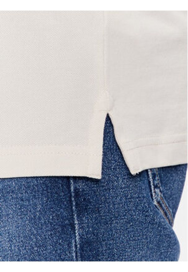 Tommy Jeans Polo DM0DM18312 Beżowy Slim Fit. Typ kołnierza: polo. Kolor: beżowy. Materiał: bawełna