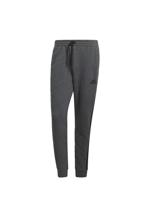 Adidas - Spodnie męskie adidas Essentials Tapered Cuff 3 Stripes. Kolor: czarny, szary, wielokolorowy. Materiał: wiskoza, polar, poliester, bawełna. Sport: joga i pilates, fitness