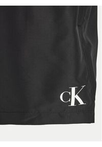 Calvin Klein Swimwear Szorty kąpielowe KM0KM01051 Czarny Regular Fit. Kolor: czarny. Materiał: syntetyk