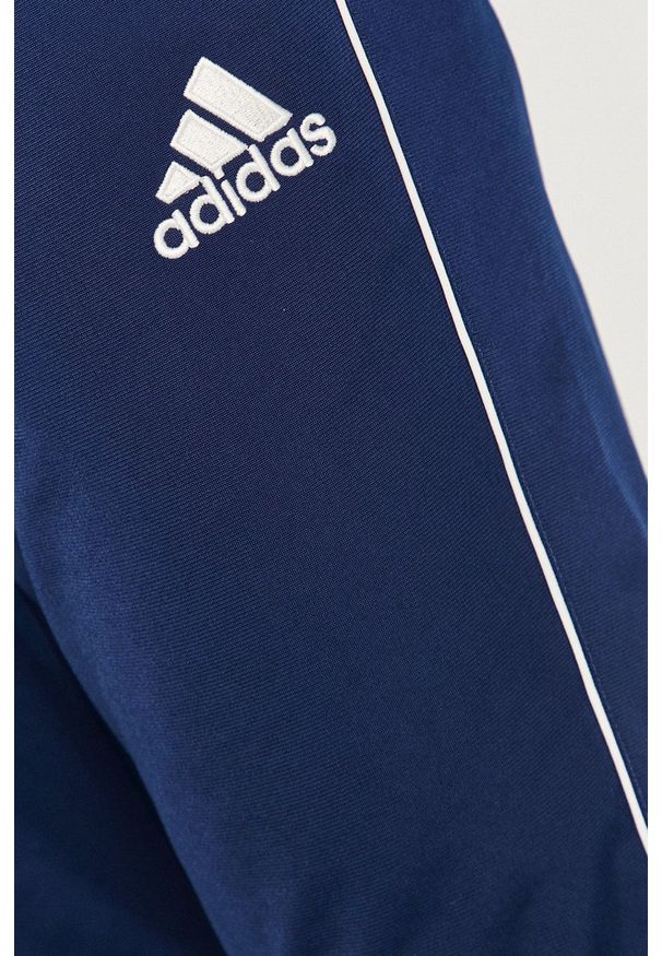 adidas Performance - Spodnie. Kolor: niebieski. Wzór: aplikacja