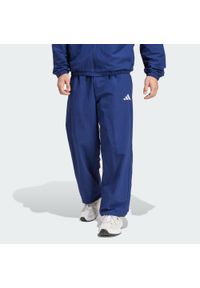 Adidas - Spodnie Essential Small Logo Woven Open Hem. Kolor: biały, wielokolorowy, niebieski. Materiał: tkanina
