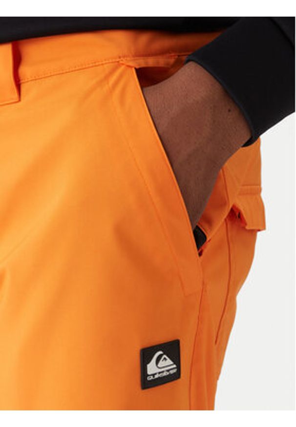 Quiksilver Spodnie snowboardowe Estate EQYTP03237 Pomarańczowy Slim Fit. Kolor: pomarańczowy. Materiał: syntetyk. Sport: snowboard