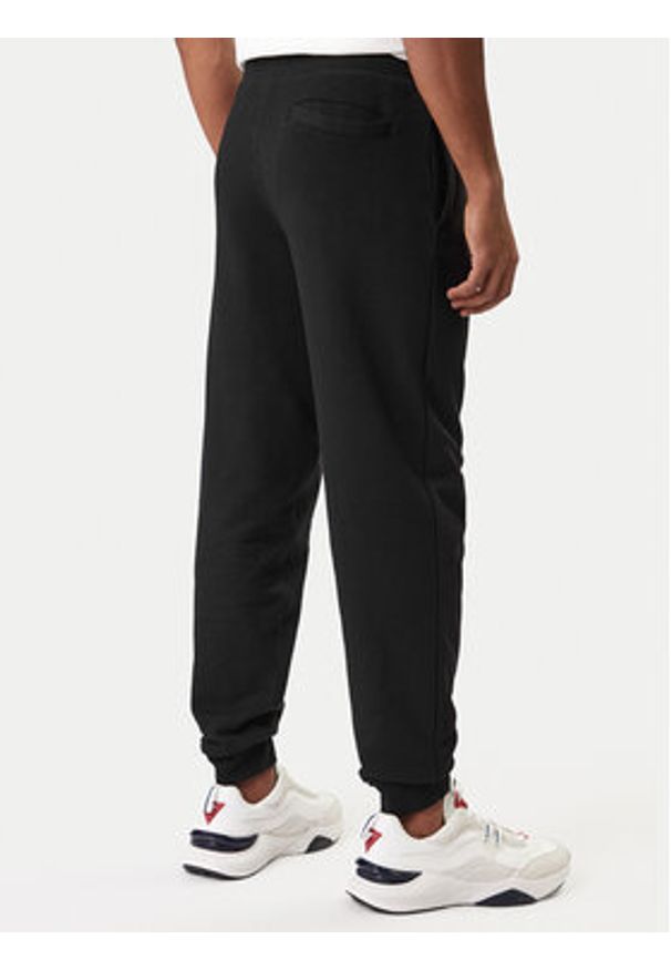 Guess Spodnie dresowe Z6RB12 KAIJ1 Czarny Regular Fit. Kolor: czarny. Materiał: bawełna